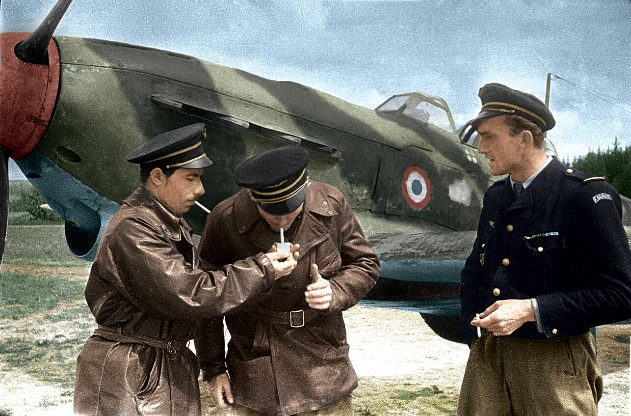 Normandie-Niemen-pilots-Joseph-Risso,-Derbe-and-Noel-Castelain-next-to-a-Yak-1B-01.png
